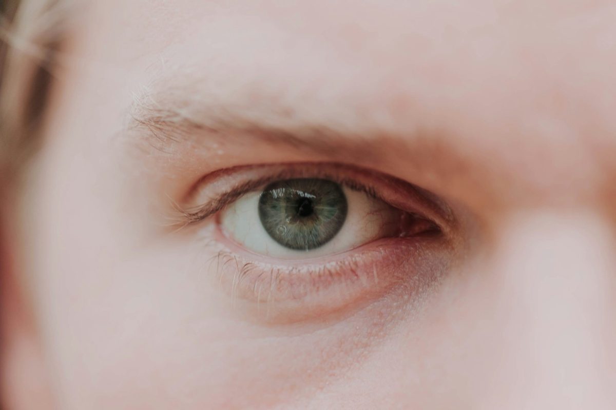 Close-up of a human eye, representing eye twitching during pregnancy